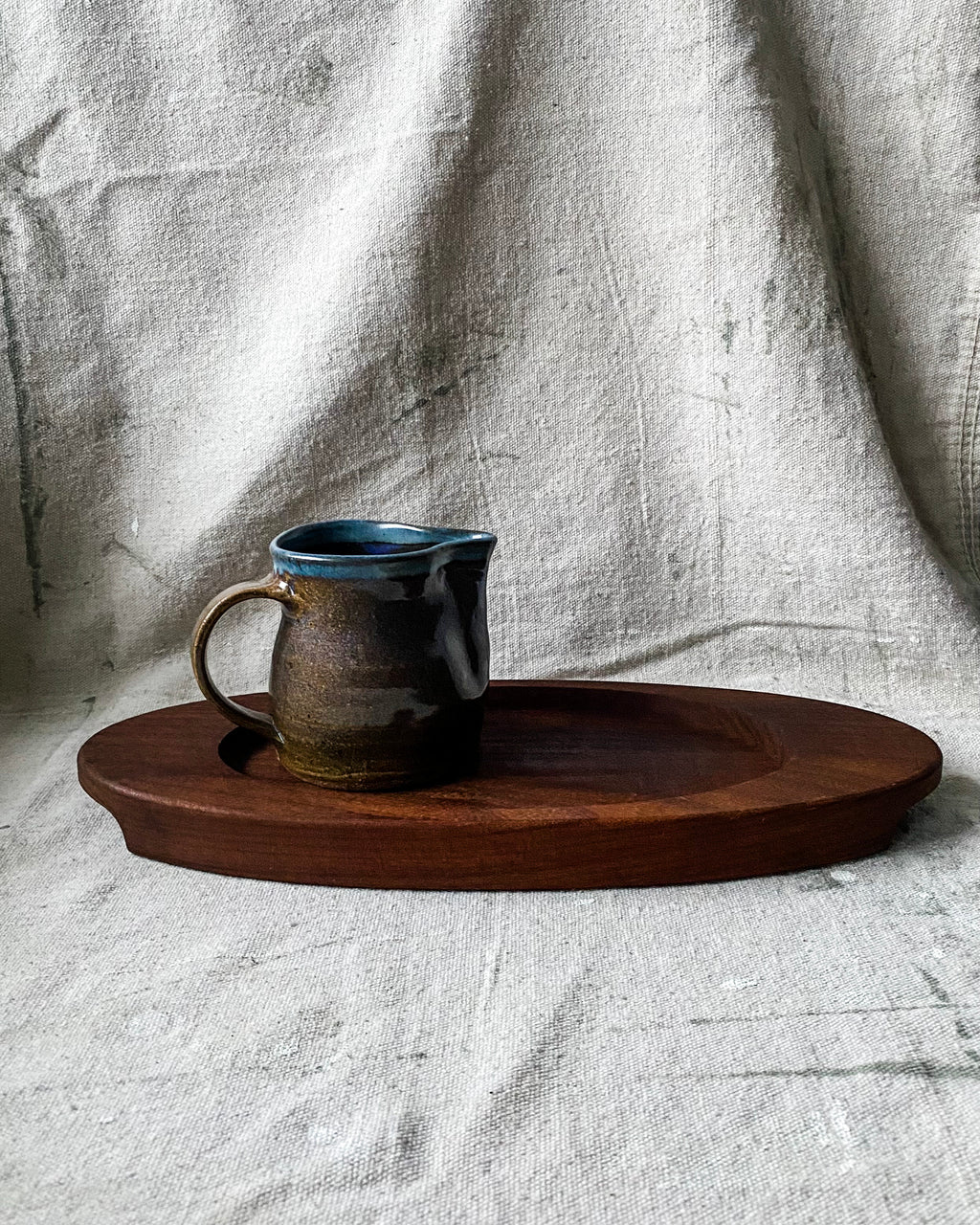 Brown and Blue Ceramic Pitcher