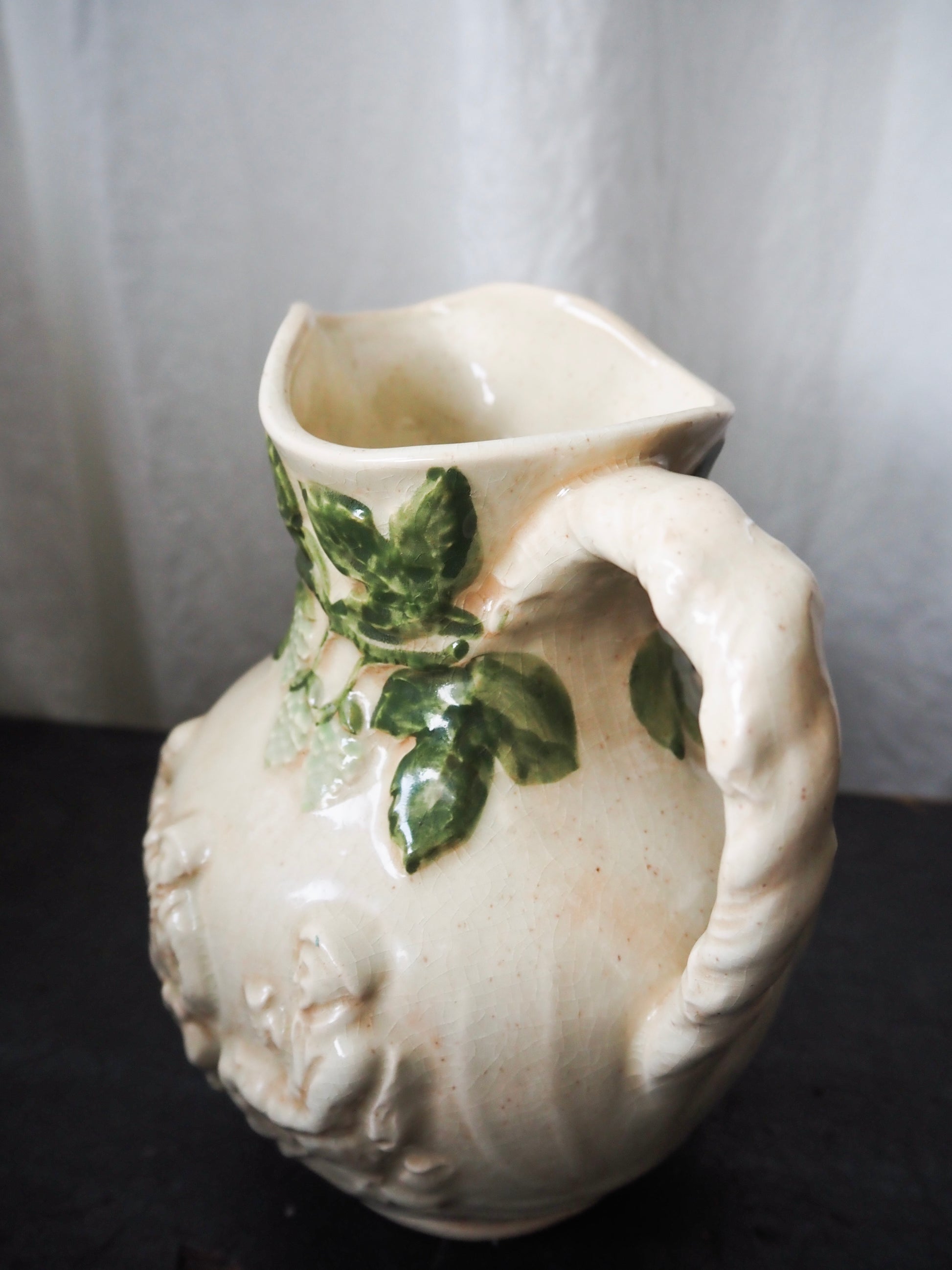 Vintage High-Relief Ceramic Pitcher with Figures and Hop Vines