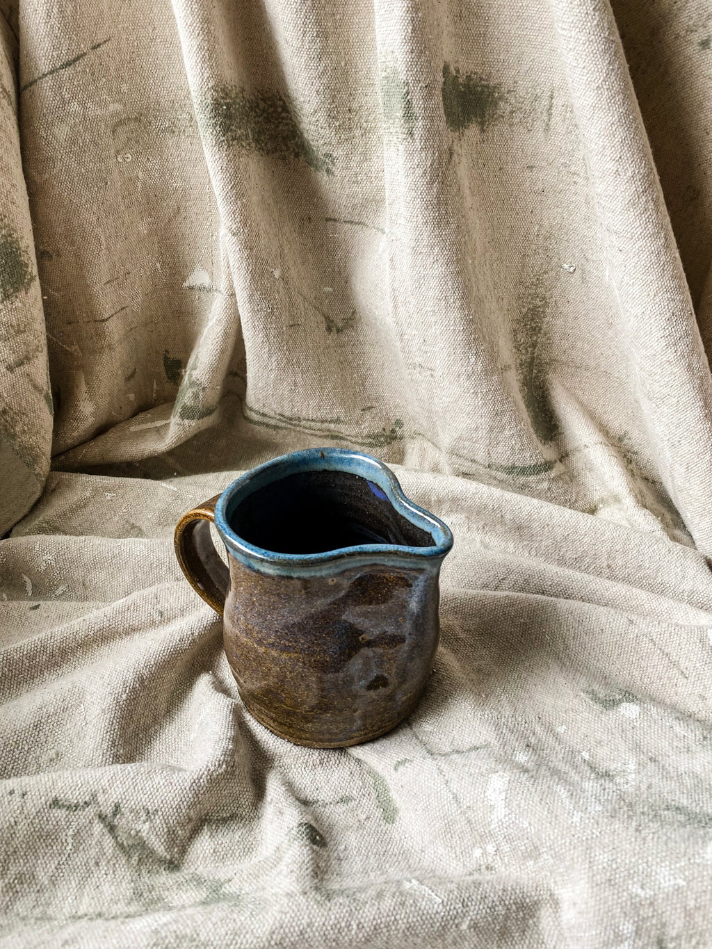 Brown and Blue Ceramic Pitcher