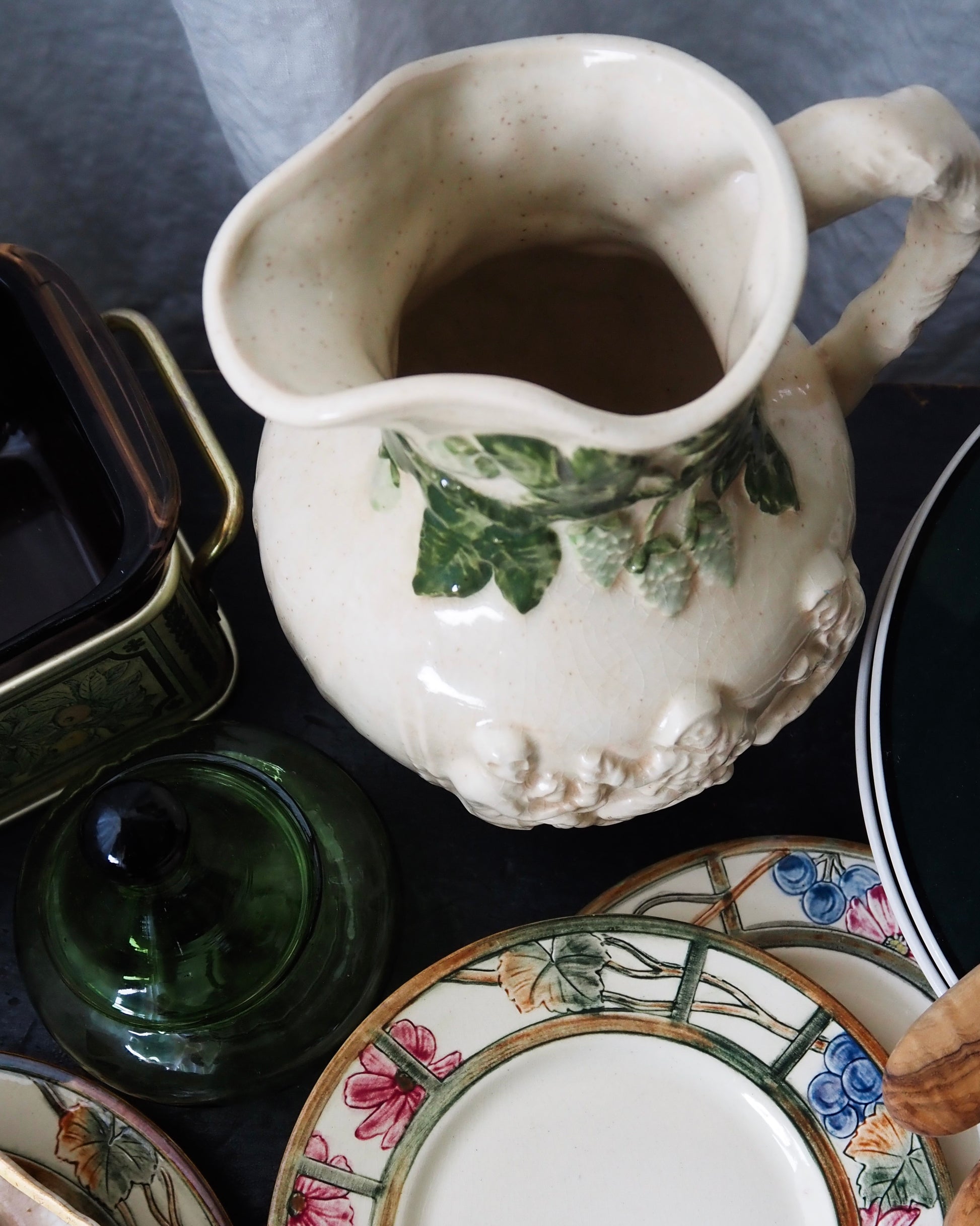 Vintage High-Relief Ceramic Pitcher with Figures and Hop Vines